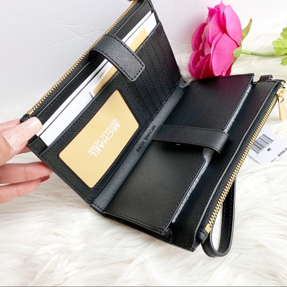 Michael Kors Handbags - NWT Michael Kors Doublw Zip Wristlet